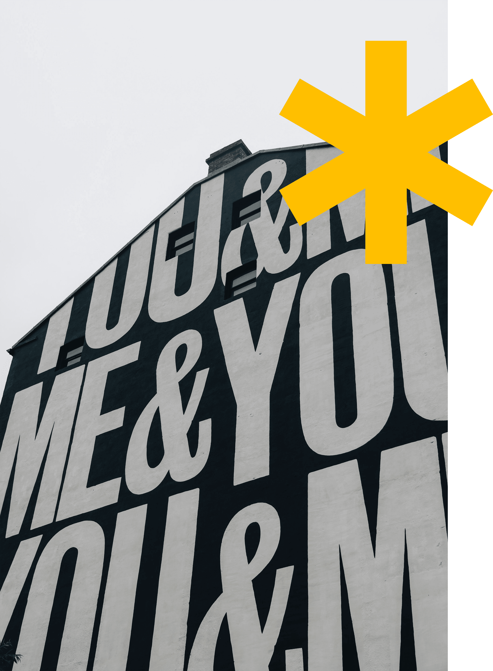Large mural text reading you and me